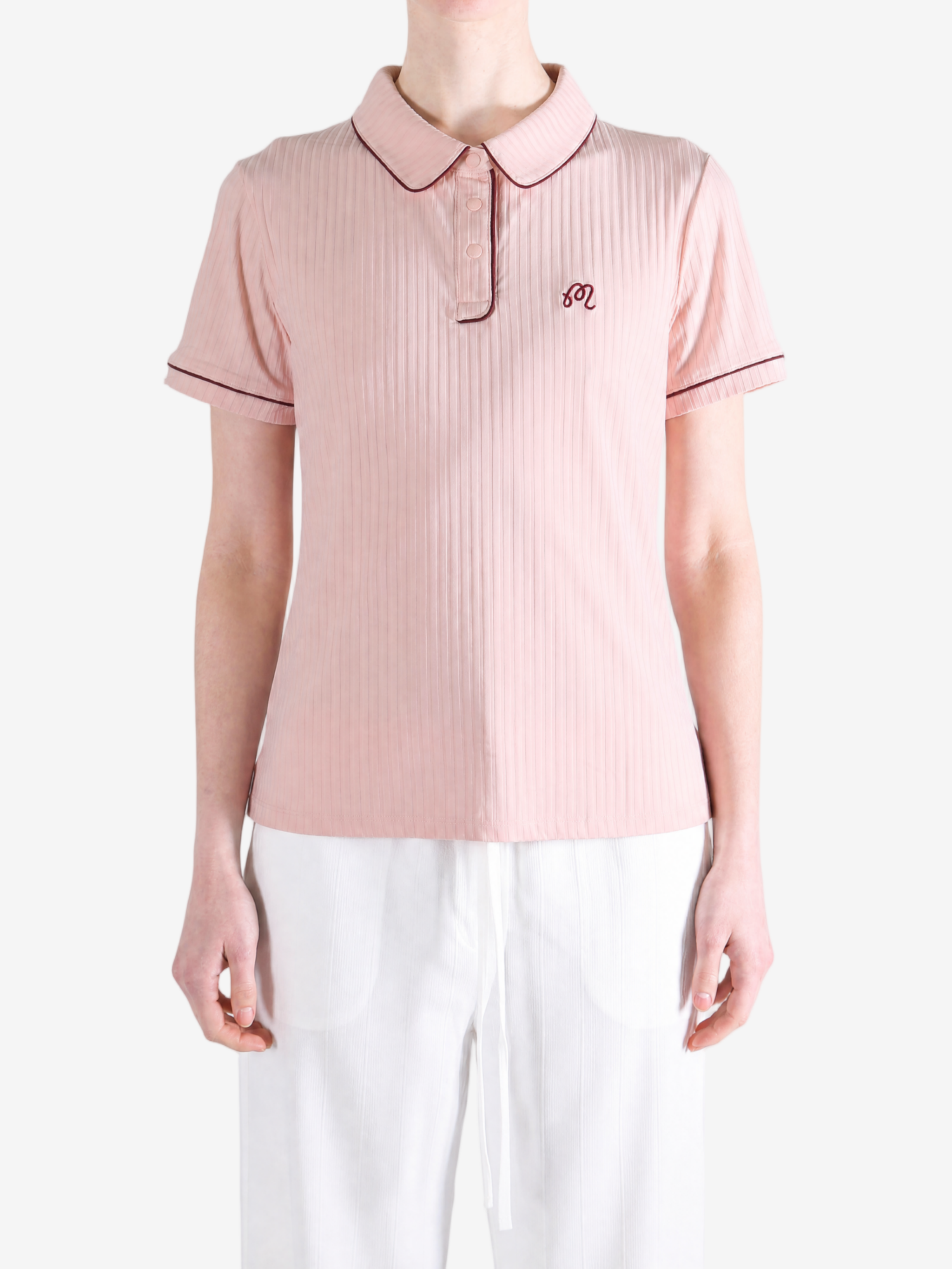 Pink shirt worn by a person, showing the shirt fit