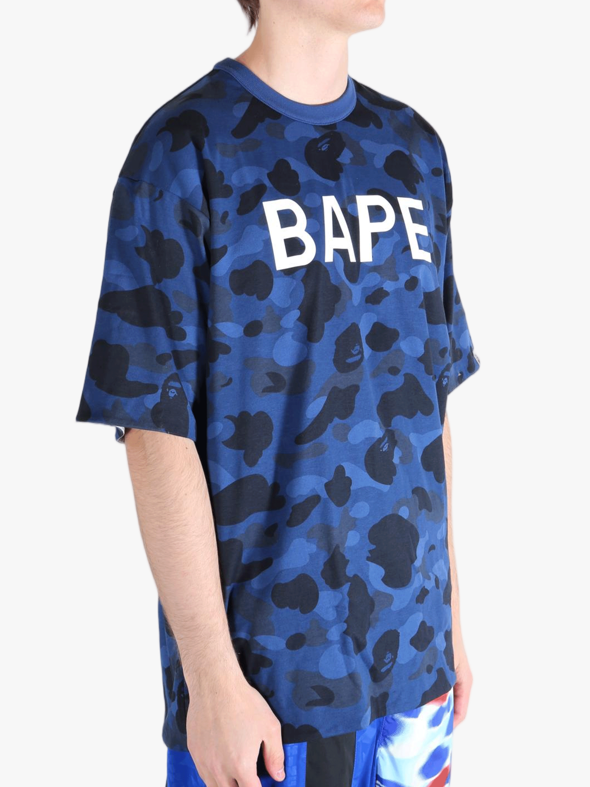 Blue t-shirt worn by a person, showing the shirt's fit