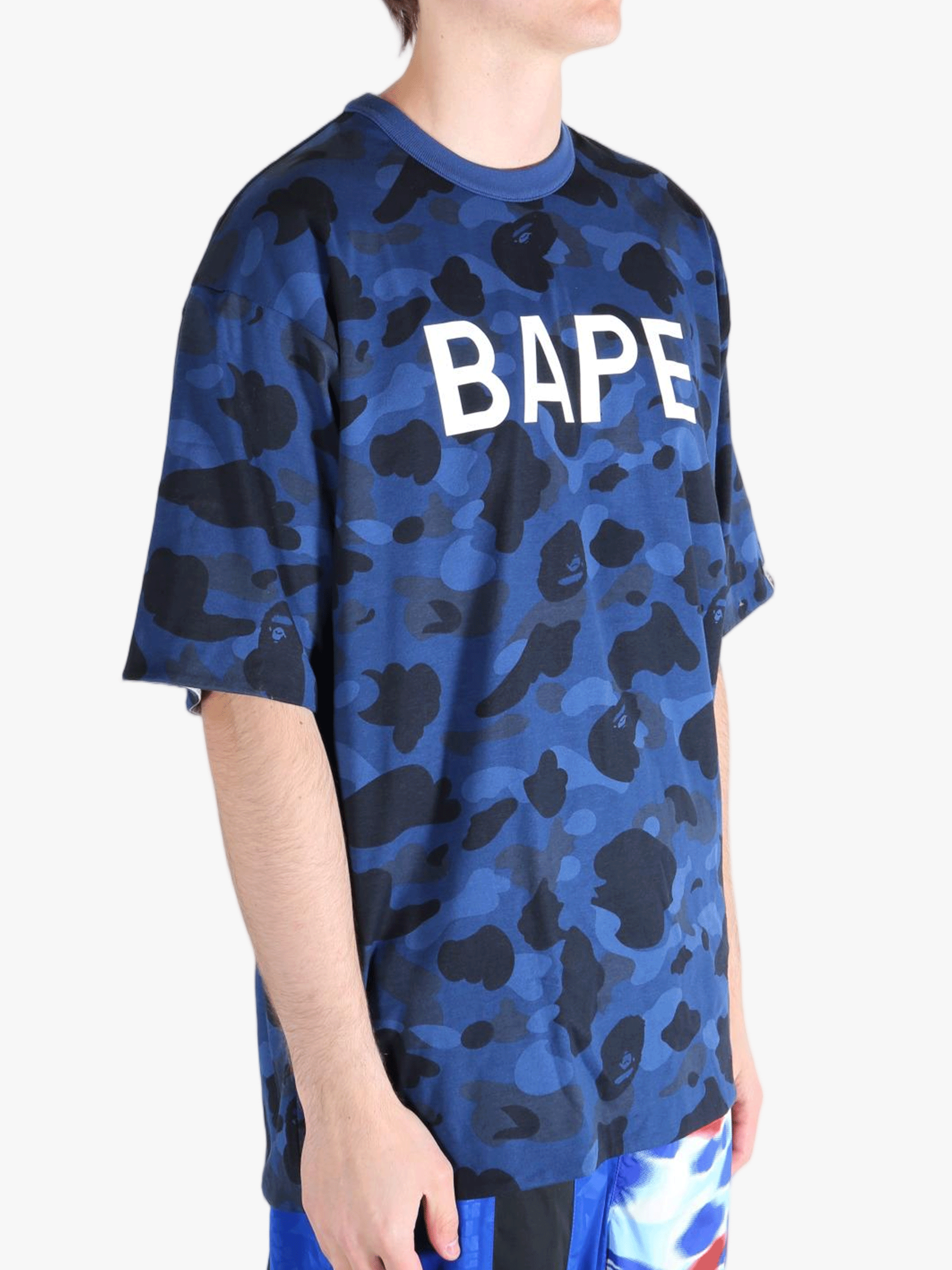 Blue t-shirt worn by a person, showing the shirt's fit