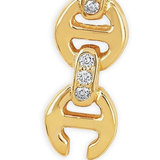 Close up of gold earring,showing texture of the 18kt yellow gold fabric