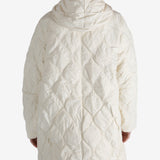 White coat worn by a person, showing the coat fit