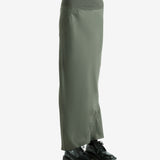 Green skirt worn by a person, showing the skirt fit