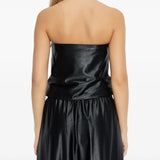 Black tops worn by a person, showing the tops fit