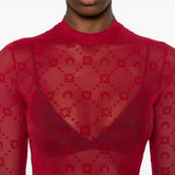 Close up of red top, showing texture of the fabirc