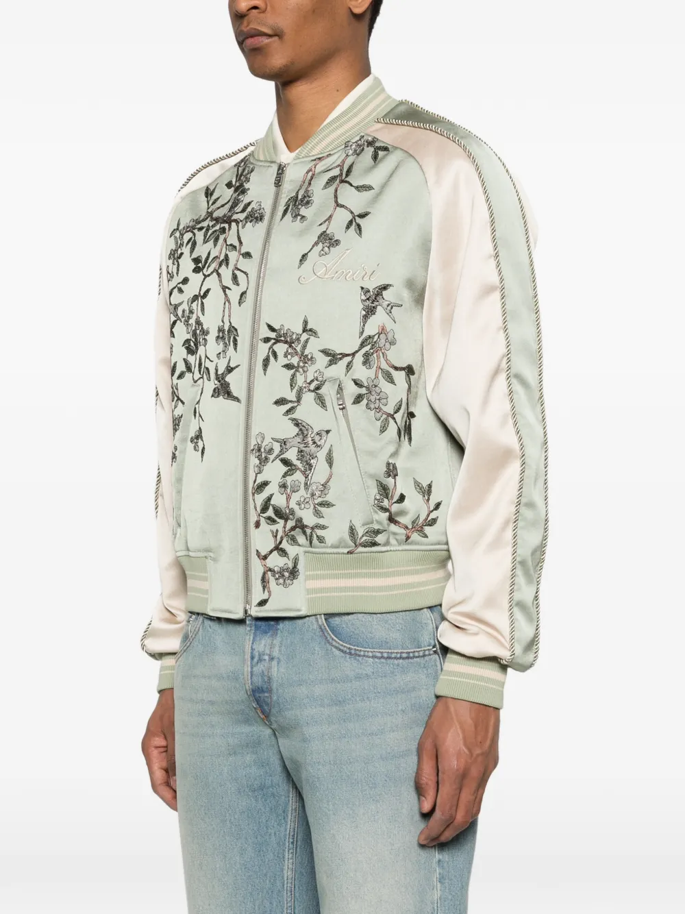 Green jackets-coat worn by a person, showing the jackets-coat's fit