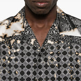 Close up of black shirt, showing texture of the silk fabric