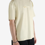 Tan t-shirt worn by a person, showing the t-shirt's view