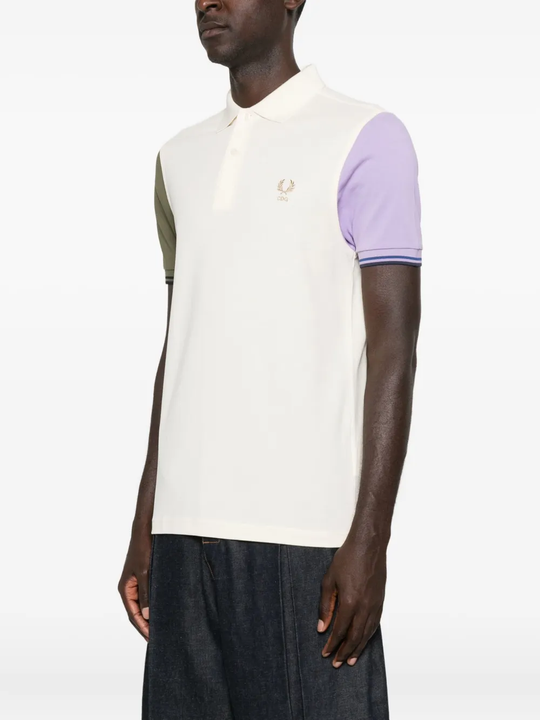 White shirt worn by a person, showing the cotton fit