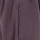 Close up of Brown pants, showing texture of the 100% cotton fabric