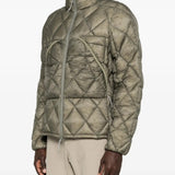 Green jacket worn by a person, showing the jacket fit