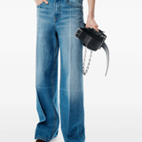 Blue pants worn by a person, showing the pants fit