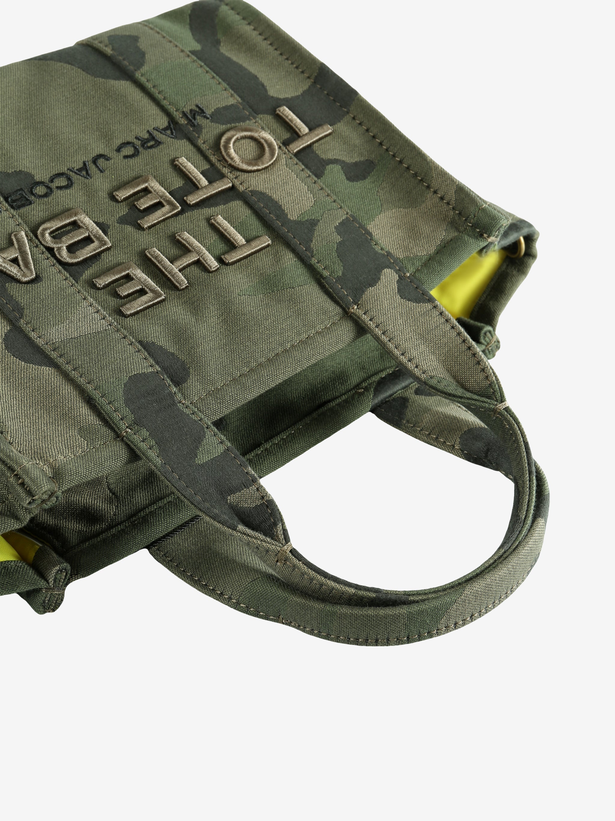 Close up of green bag, showing texture of the cotton fabric