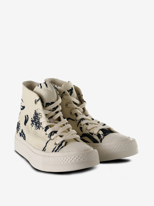 Tan sneakers,side view