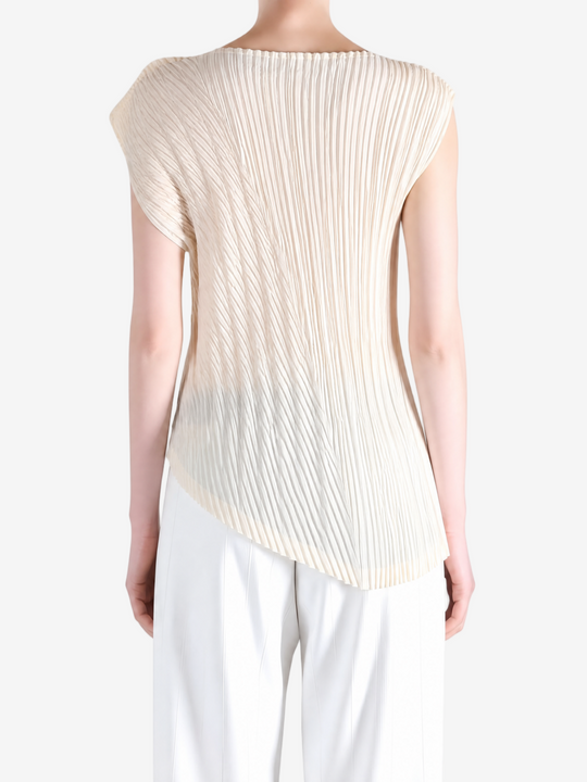 Tan shirt worn by a person, showing the shirt fit
