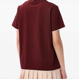 Red t-shirt  worn by a person, showing the t-shirt's fit