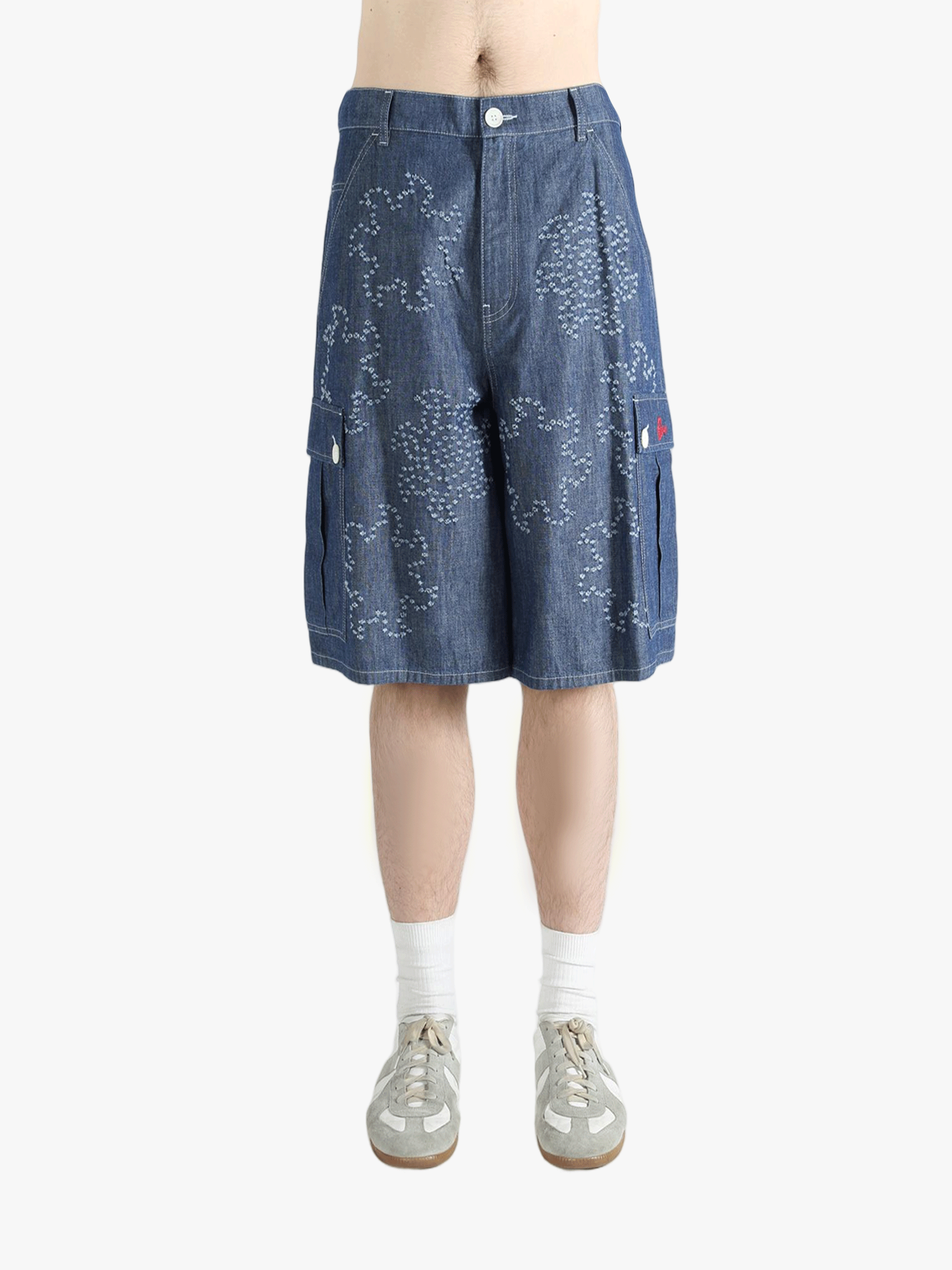 Blue shorts worn by a person, showing the shorts fit