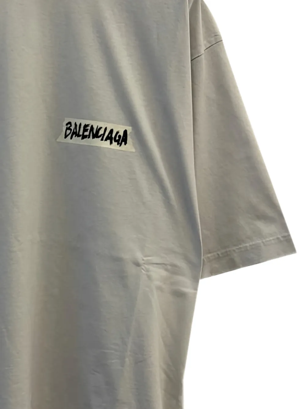 Close up of grey t-shirt, showing texture of the Cotton fabric