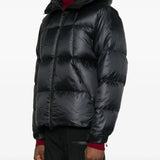 Black parka worn by a person, showing the parka's fit