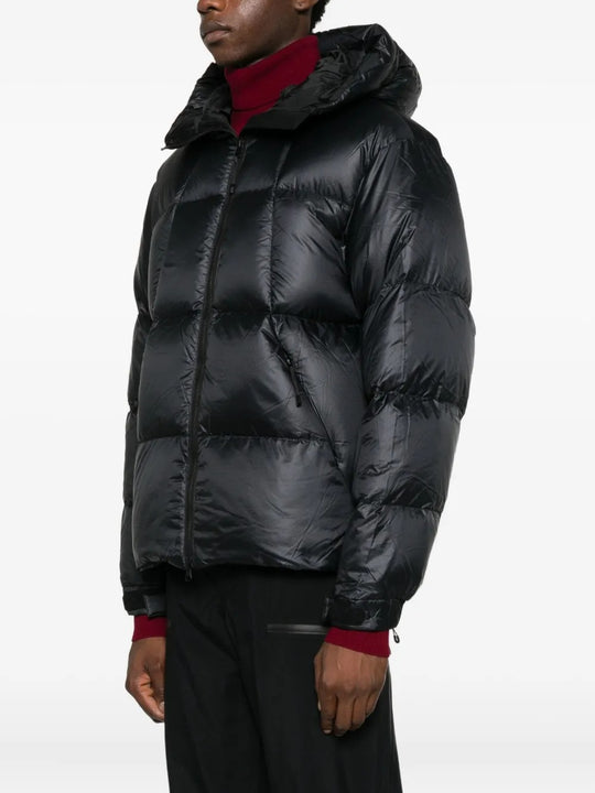 Black parka worn by a person, showing the parka's fit