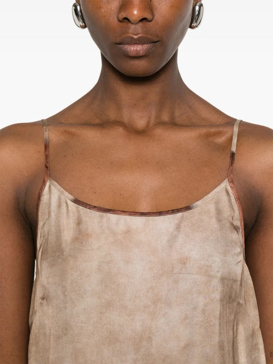 Close up of tan dress, showing texture of the Viscose fabric