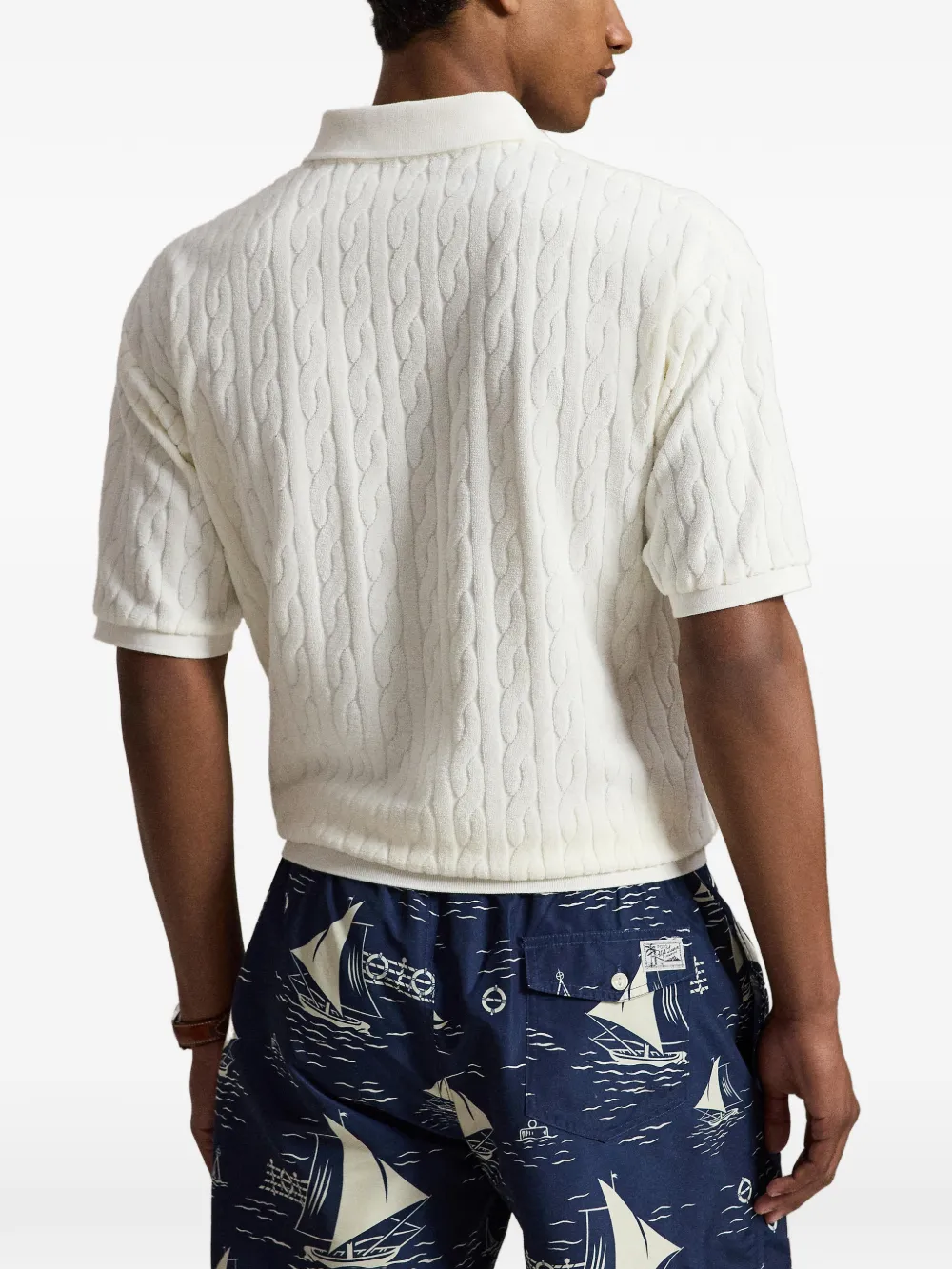 White shirt worn by a person, showing the shirt fit