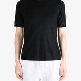 Black t-shirt worn by a person, showing the t-shirt fit
