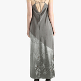 Grey dress worn by a person, showing the dress's fit