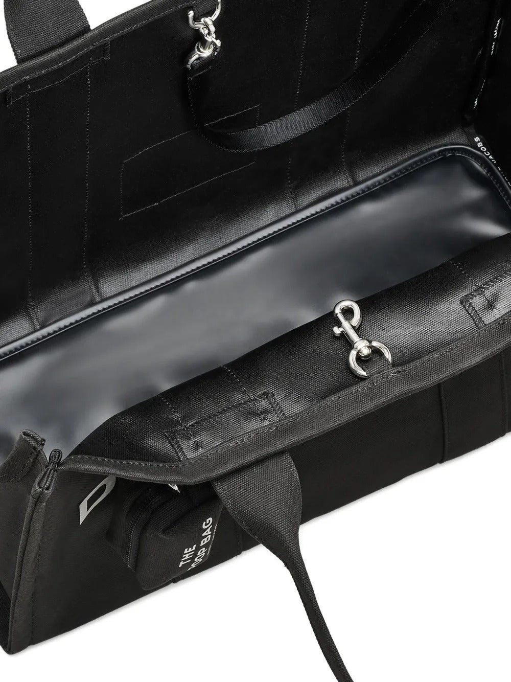 Close up of black bags, showing texture of the cotton fabric