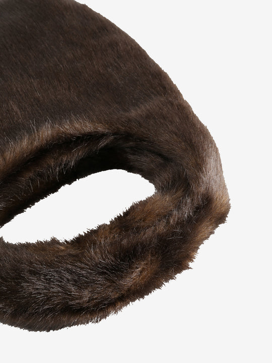 Close up of the brown bag, showing texture of the leather fabric