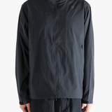 Gray jacket worn by a person, showing the jacket fit