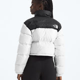 White jacket worn by a person, showing the jacket fit
