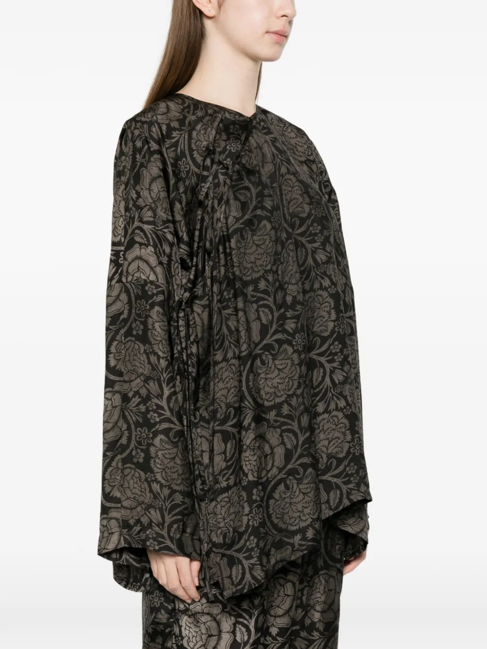 black tops worn by a person, showing the tops fit