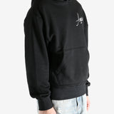 Black hoodie worn by a person, showing the hoodie fit