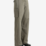 Tan pants worn by a person, showing the pants' fit