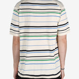 Tan shirt worn by a person, showing the shirt's fit