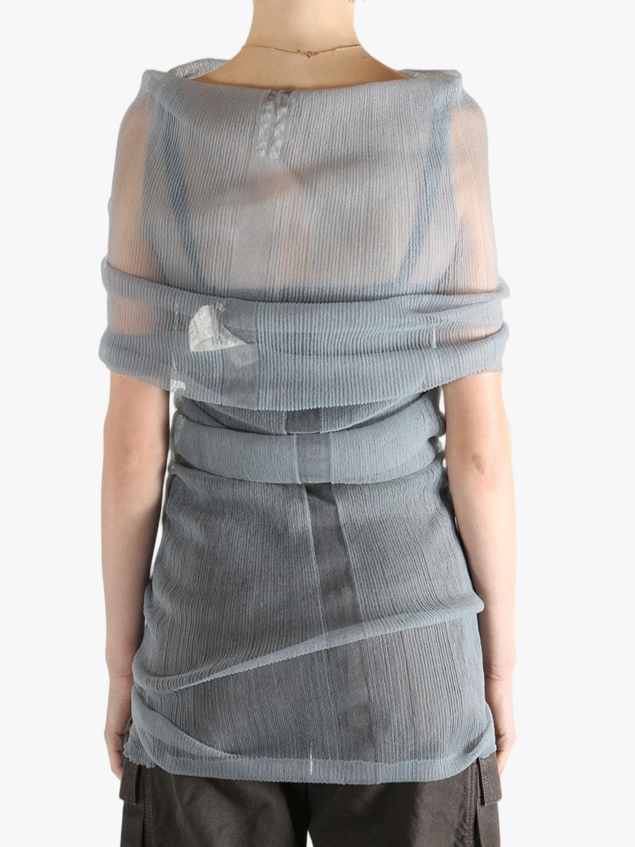 Grey shirt worn by a person, showing the tight fit.