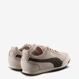 Pink sneakers, back view