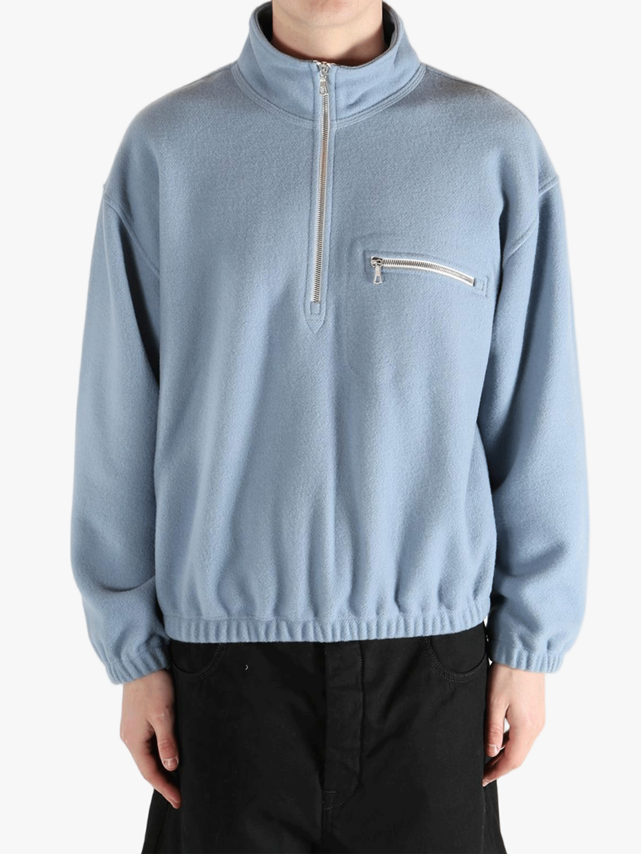 Blue hoodie worn by a person, showing the hoodie 's fit