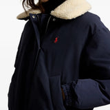 Navy jacket worn by a person, showing the jacket fit