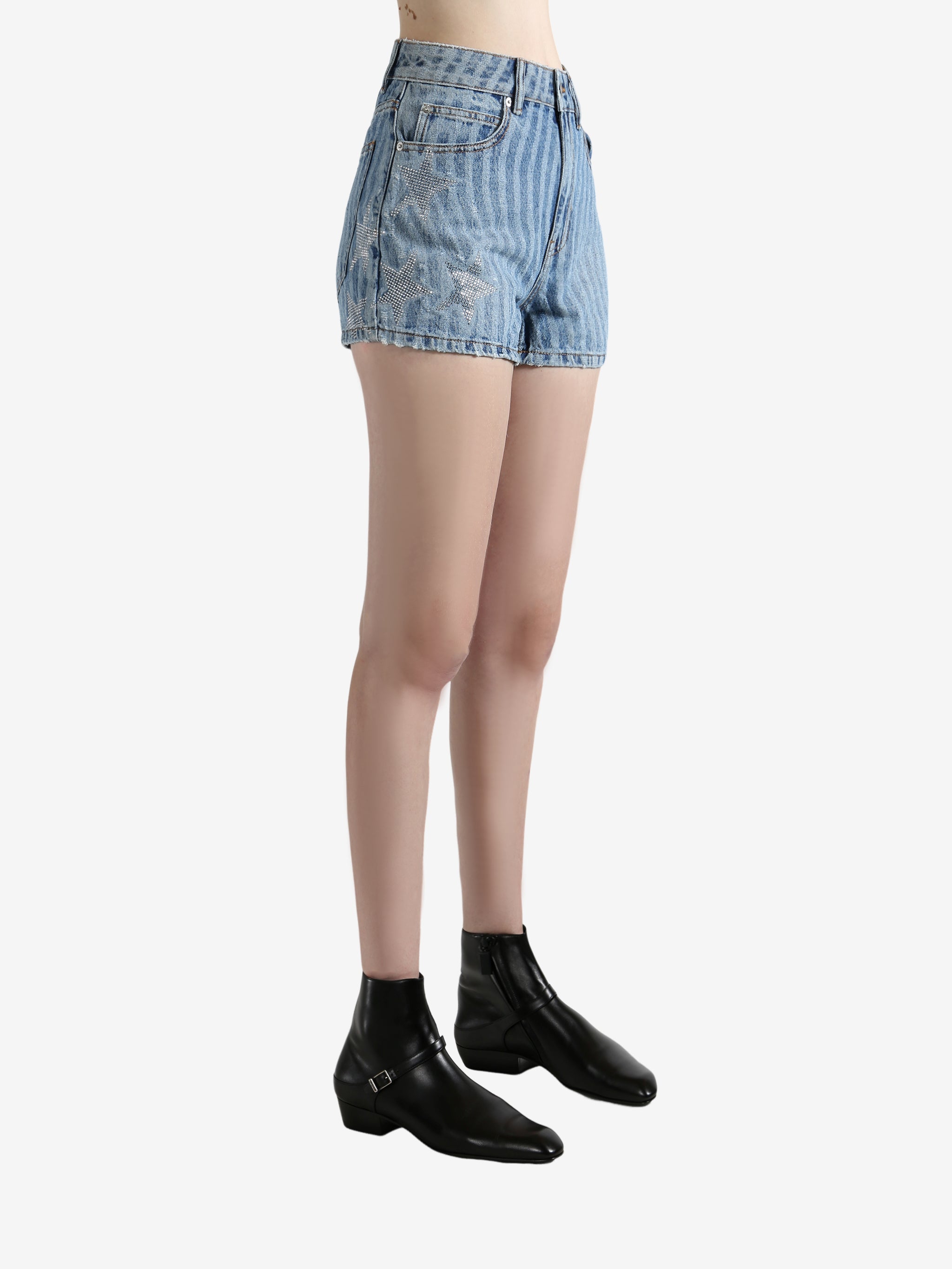 Blue shorts worn by a person, showing the shorts' fit