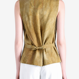 Green tops worn a person,showing the tops fit