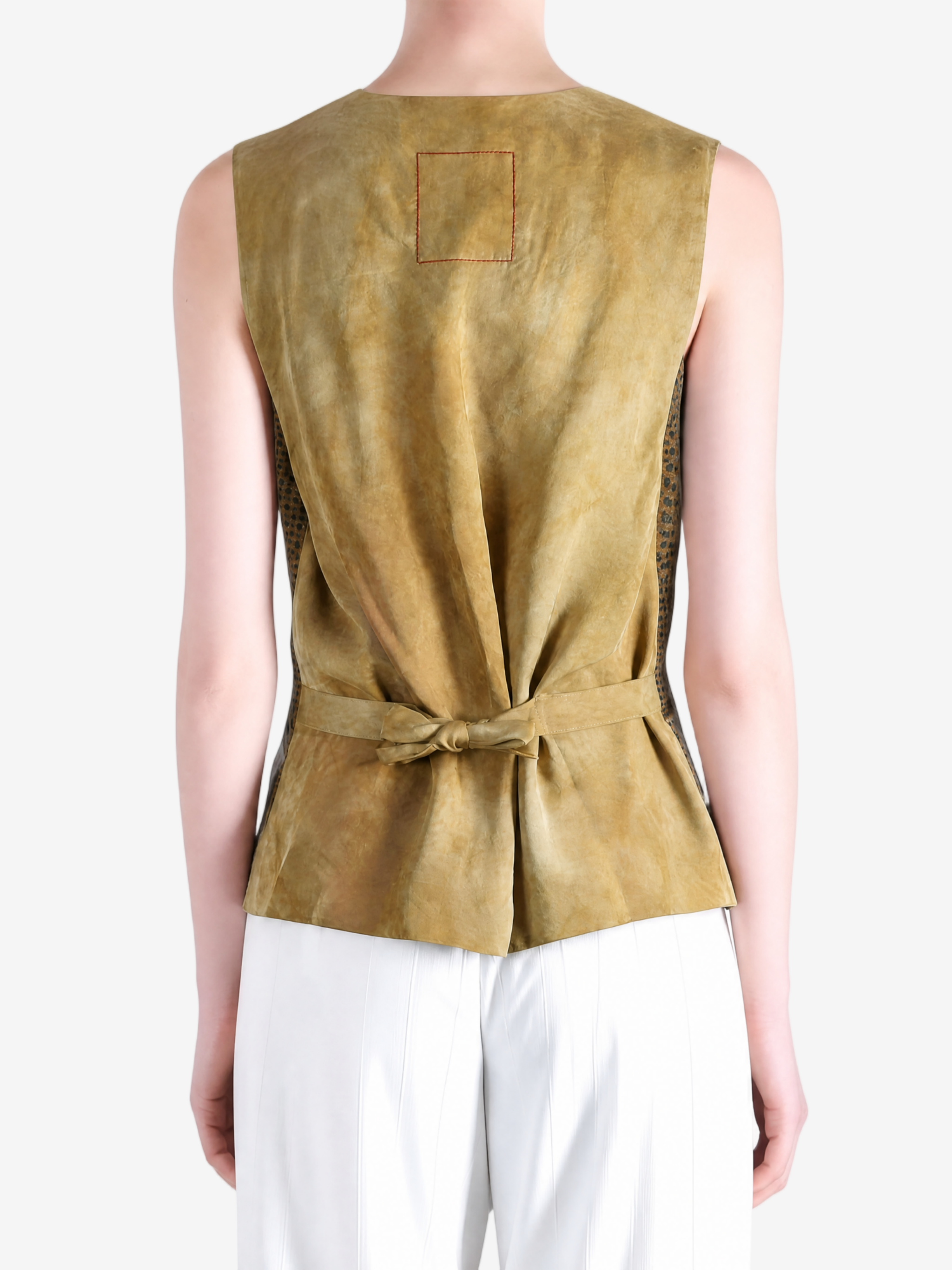 Green tops worn a person,showing the tops fit