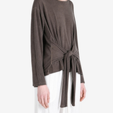 Brown top worn by a person, showing the top fit