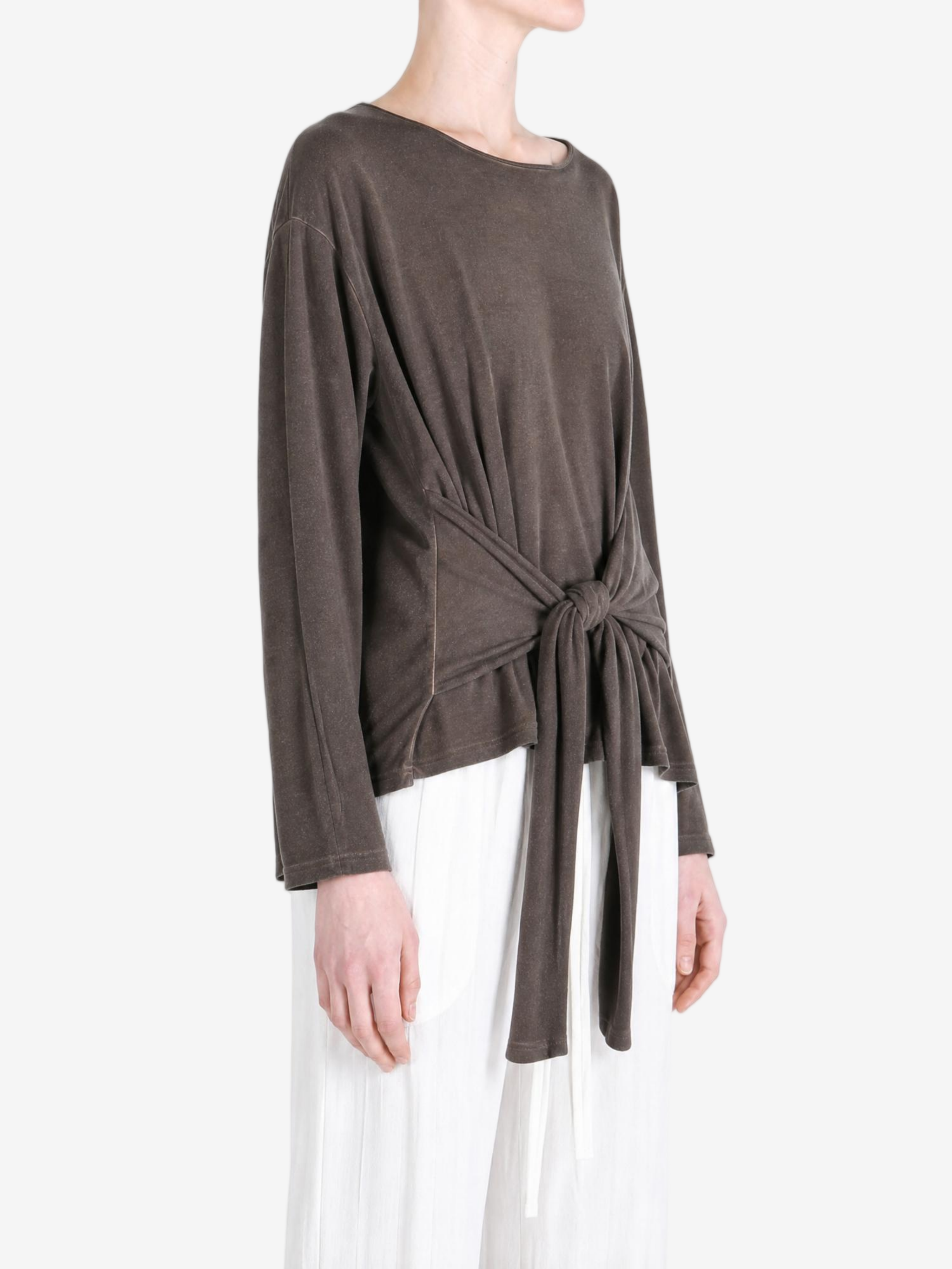 Brown top worn by a person, showing the top fit
