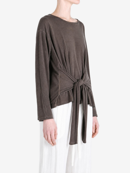 Brown top worn by a person, showing the top fit