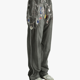 Grey pant worn by a person, showing the pant's fit