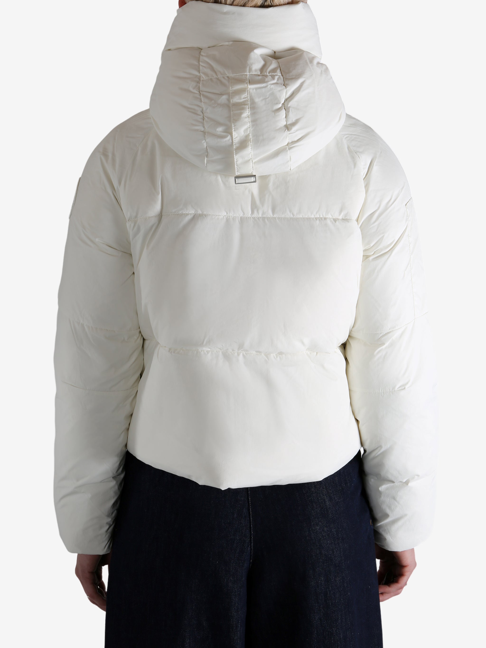 white down jacket，worn by a person, showing the down jacket fit