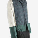 Green jacket worn by a person, showing the jacket's fit