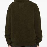 Green shirt worn by a person, showing the shirt fit