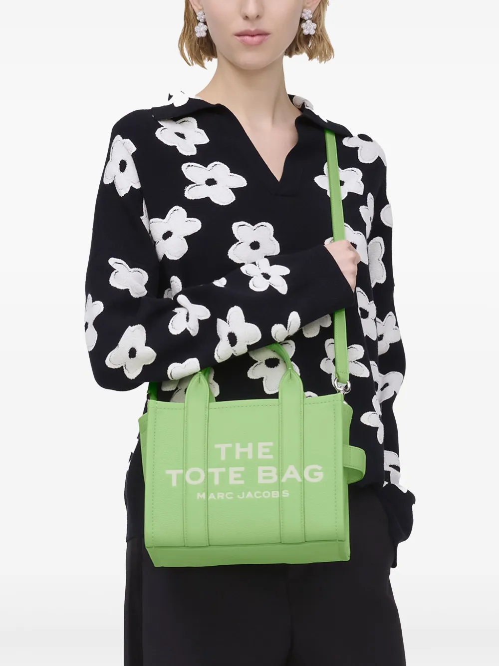 Green bags worn by a person, showing the bags fit
